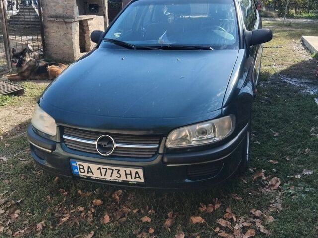 Зеленый Опель Омега, объемом двигателя 2 л и пробегом 400 тыс. км за 2850 $, фото 1 на Automoto.ua