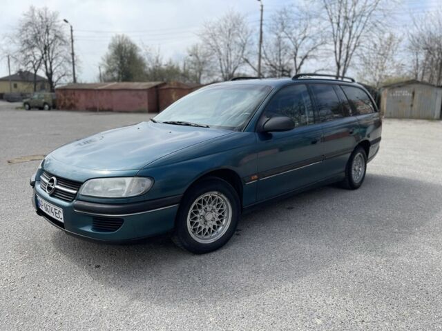 Зеленый Опель Омега, объемом двигателя 2 л и пробегом 290 тыс. км за 2900 $, фото 1 на Automoto.ua