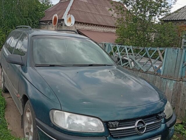Зеленый Опель Омега, объемом двигателя 2 л и пробегом 330 тыс. км за 2000 $, фото 1 на Automoto.ua
