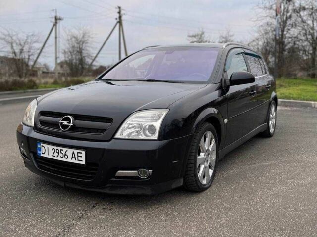 Черный Опель Сигнум, объемом двигателя 2.2 л и пробегом 297 тыс. км за 4600 $, фото 1 на Automoto.ua