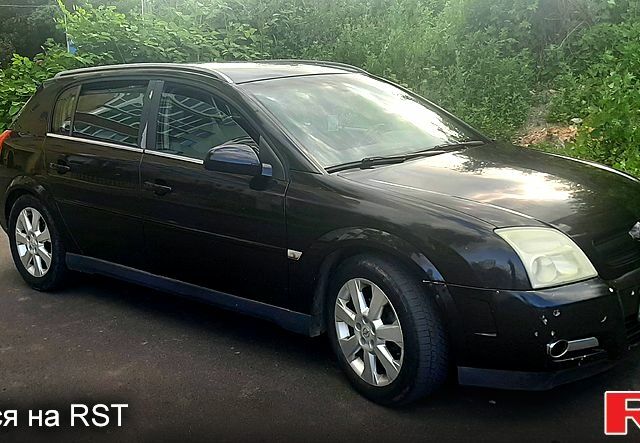 Черный Опель Сигнум, объемом двигателя 2.2 л и пробегом 220 тыс. км за 2950 $, фото 1 на Automoto.ua