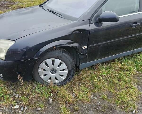 Черный Опель Сигнум, объемом двигателя 2.2 л и пробегом 370 тыс. км за 2000 $, фото 1 на Automoto.ua