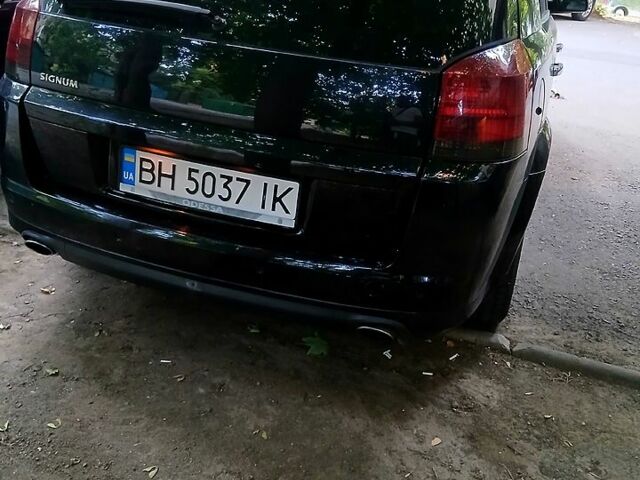 Черный Опель Сигнум, объемом двигателя 3 л и пробегом 245 тыс. км за 5000 $, фото 1 на Automoto.ua