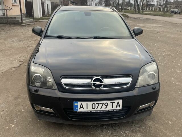 Черный Опель Сигнум, объемом двигателя 2.2 л и пробегом 261 тыс. км за 4400 $, фото 1 на Automoto.ua