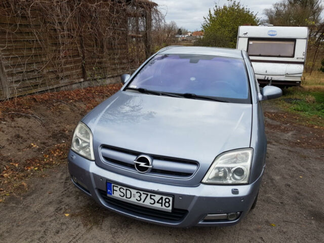 Синий Опель Сигнум, объемом двигателя 3 л и пробегом 230 тыс. км за 3500 $, фото 1 на Automoto.ua
