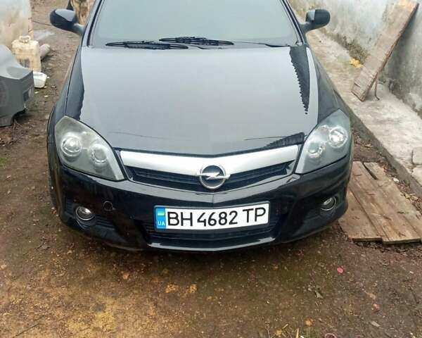 Черный Опель Тигра, объемом двигателя 1.4 л и пробегом 164 тыс. км за 5000 $, фото 1 на Automoto.ua