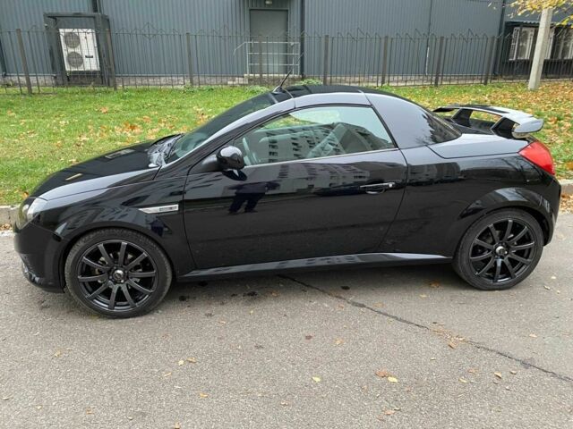 Черный Опель Тигра, объемом двигателя 1.8 л и пробегом 167 тыс. км за 5000 $, фото 1 на Automoto.ua