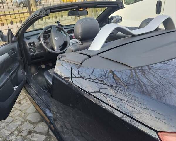 Чорний Опель Тігра, об'ємом двигуна 1.36 л та пробігом 170 тис. км за 4100 $, фото 1 на Automoto.ua