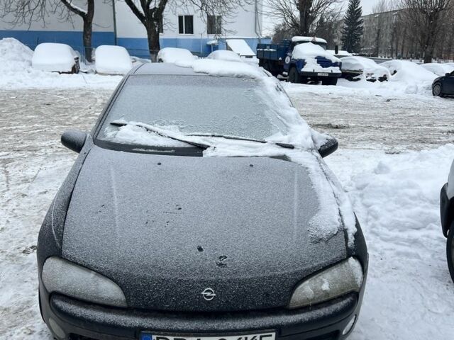 Черный Опель Тигра, объемом двигателя 0 л и пробегом 140 тыс. км за 1400 $, фото 1 на Automoto.ua