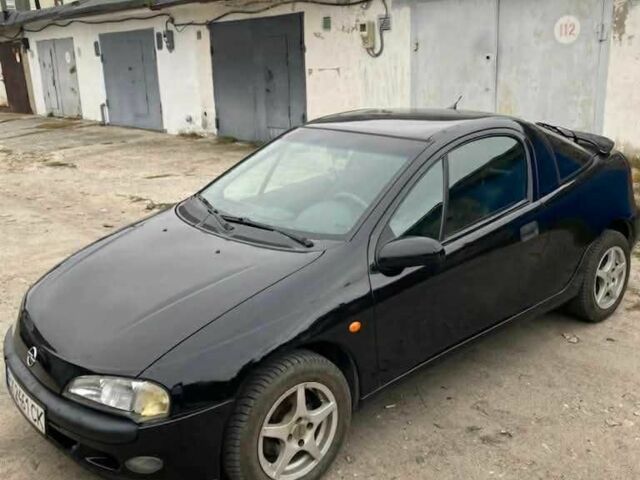 Чорний Опель Тігра, об'ємом двигуна 0 л та пробігом 240 тис. км за 2019 $, фото 1 на Automoto.ua