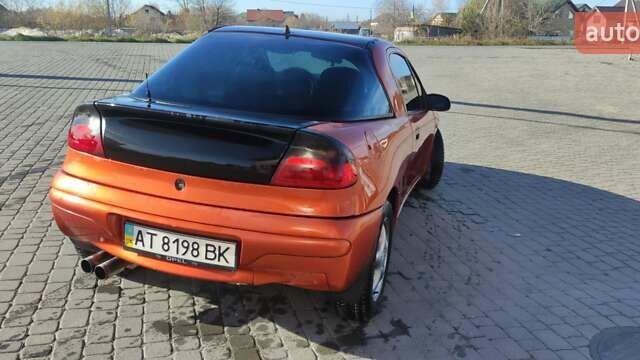 Коричневый Опель Тигра, объемом двигателя 1.39 л и пробегом 194 тыс. км за 1500 $, фото 1 на Automoto.ua