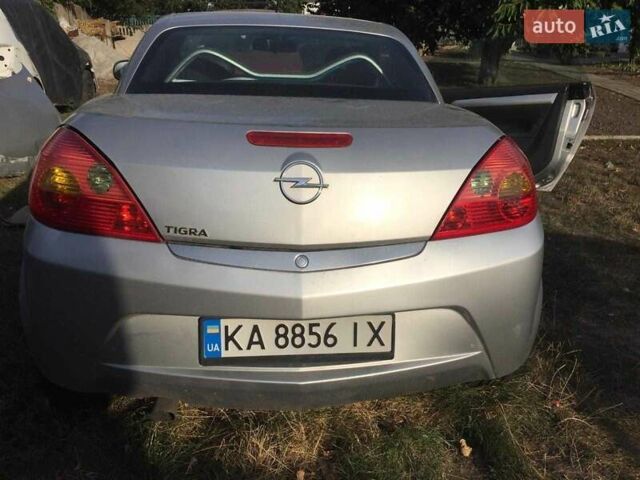 Сірий Опель Тігра, об'ємом двигуна 1.4 л та пробігом 150 тис. км за 2500 $, фото 1 на Automoto.ua