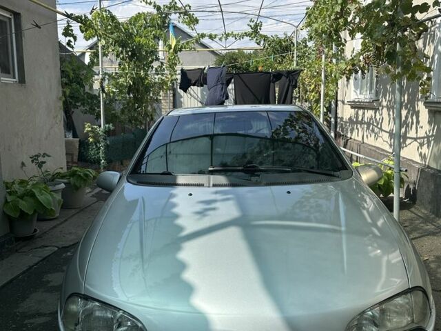 Серый Опель Тигра, объемом двигателя 1.4 л и пробегом 188 тыс. км за 2200 $, фото 1 на Automoto.ua