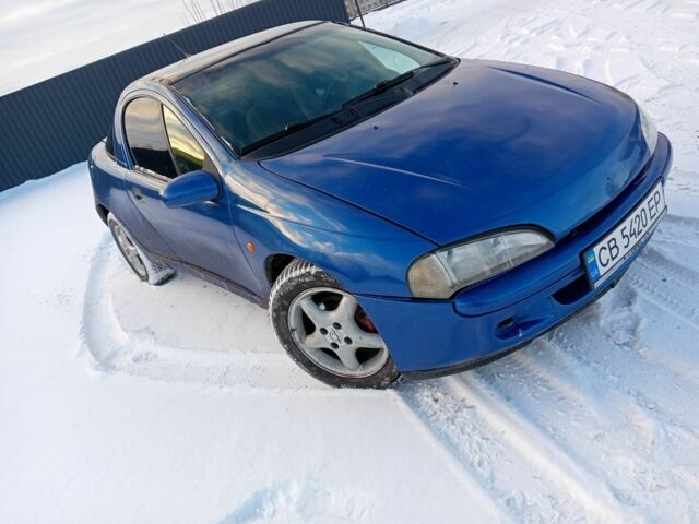 Синій Опель Тігра, об'ємом двигуна 1.6 л та пробігом 350 тис. км за 1650 $, фото 1 на Automoto.ua