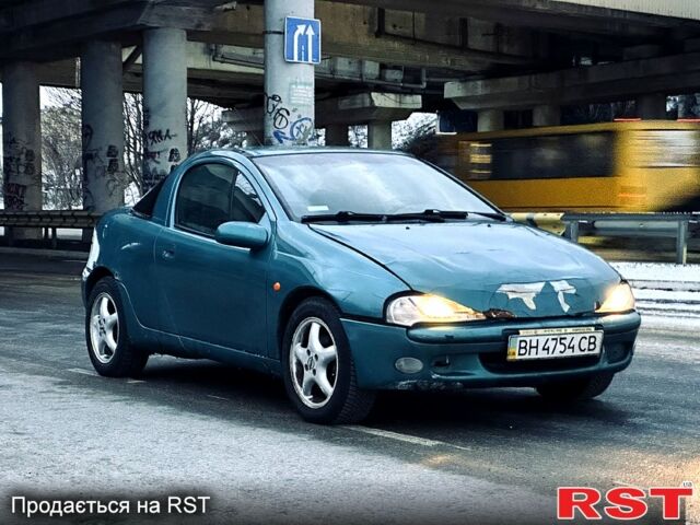 Синій Опель Тігра, об'ємом двигуна 1.6 л та пробігом 180 тис. км за 1150 $, фото 1 на Automoto.ua