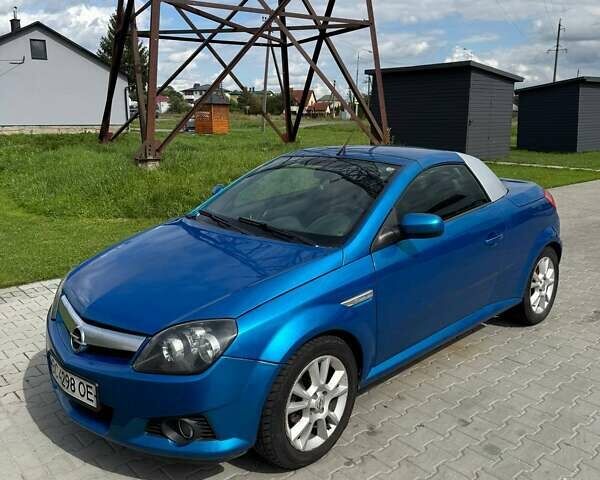 Синій Опель Тігра, об'ємом двигуна 1.39 л та пробігом 200 тис. км за 4300 $, фото 1 на Automoto.ua