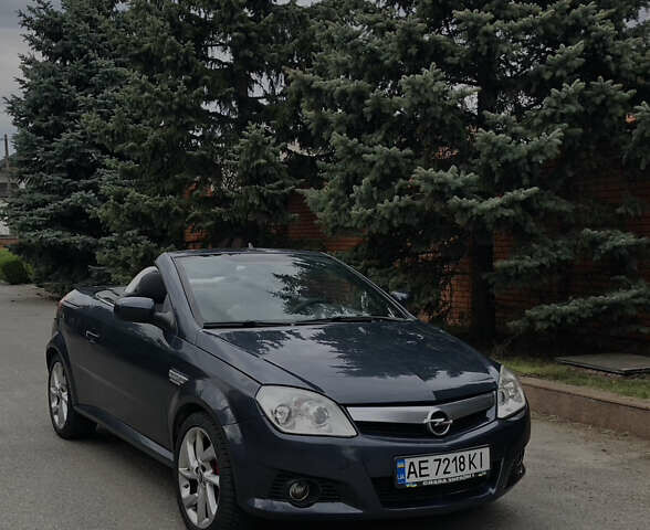 Синий Опель Тигра, объемом двигателя 1.3 л и пробегом 236 тыс. км за 4100 $, фото 1 на Automoto.ua