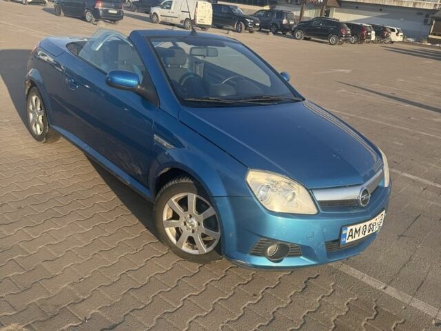 Синий Опель Тигра, объемом двигателя 1.4 л и пробегом 200 тыс. км за 2700 $, фото 1 на Automoto.ua