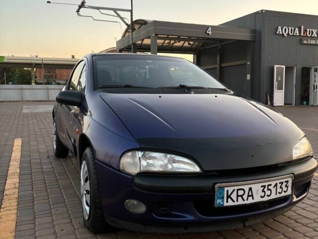 Синий Опель Тигра, объемом двигателя 0 л и пробегом 200 тыс. км за 1600 $, фото 1 на Automoto.ua