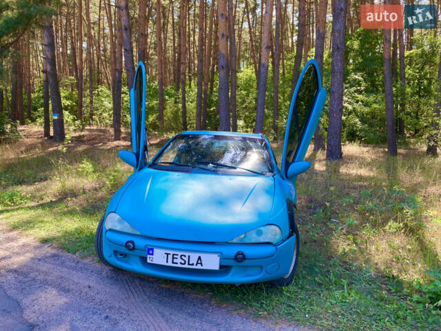 Синій Опель Тігра, об'ємом двигуна 1.6 л та пробігом 275 тис. км за 4600 $, фото 1 на Automoto.ua