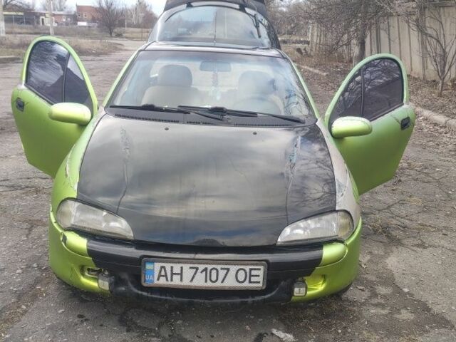 Зелений Опель Тігра, об'ємом двигуна 0 л та пробігом 386 тис. км за 1467 $, фото 1 на Automoto.ua