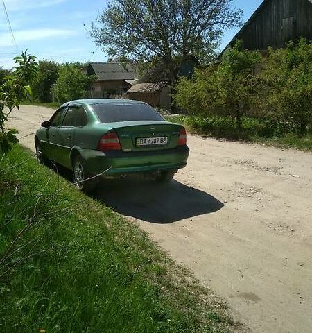 Зелений Опель Вектра Б, об'ємом двигуна 2 л та пробігом 265 тис. км за 4000 $, фото 1 на Automoto.ua