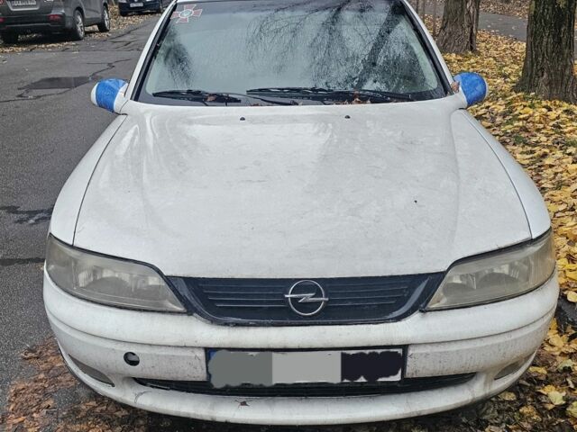 Белый Опель Вектра, объемом двигателя 0 л и пробегом 234 тыс. км за 714 $, фото 1 на Automoto.ua