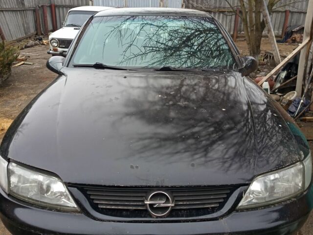 Чорний Опель Вектра, об'ємом двигуна 2 л та пробігом 400 тис. км за 500 $, фото 1 на Automoto.ua