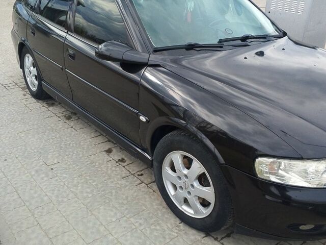 Черный Опель Вектра, объемом двигателя 2.2 л и пробегом 400 тыс. км за 3100 $, фото 1 на Automoto.ua