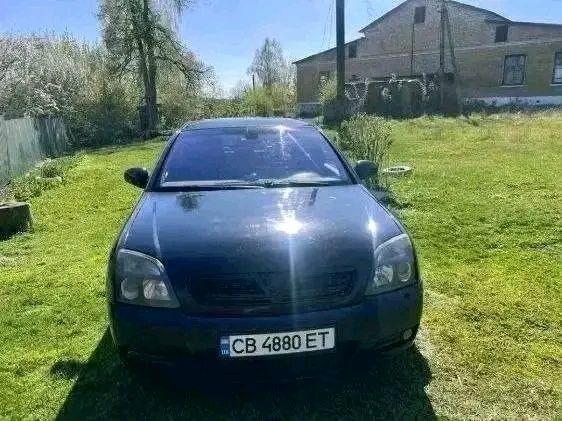 Черный Опель Вектра, объемом двигателя 2.2 л и пробегом 270 тыс. км за 1597 $, фото 1 на Automoto.ua