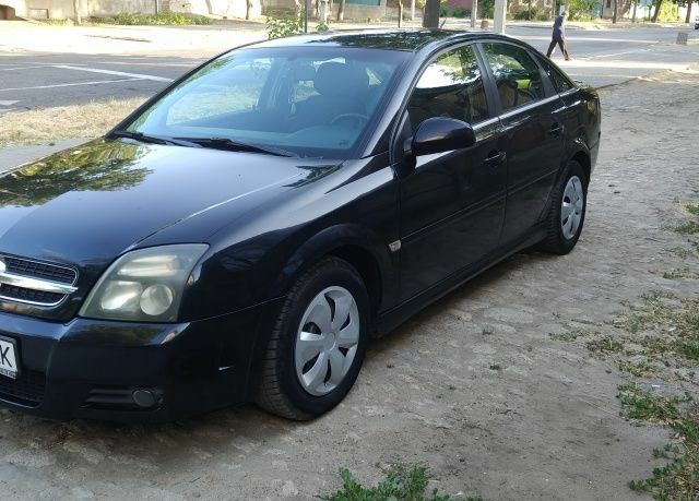 Черный Опель Вектра, объемом двигателя 2.2 л и пробегом 378 тыс. км за 5400 $, фото 1 на Automoto.ua