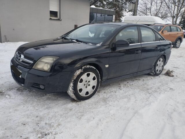 Черный Опель Вектра, объемом двигателя 1.8 л и пробегом 200 тыс. км за 1750 $, фото 1 на Automoto.ua