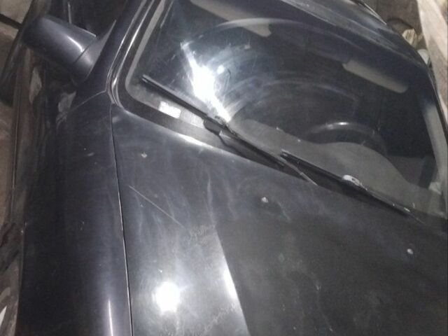 Черный Опель Вектра, объемом двигателя 1 л и пробегом 90 тыс. км за 1000 $, фото 1 на Automoto.ua