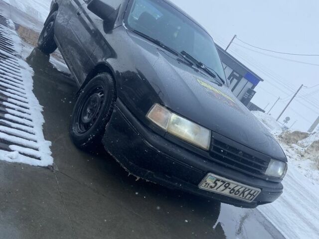 Черный Опель Вектра, объемом двигателя 1.8 л и пробегом 344 тыс. км за 650 $, фото 1 на Automoto.ua