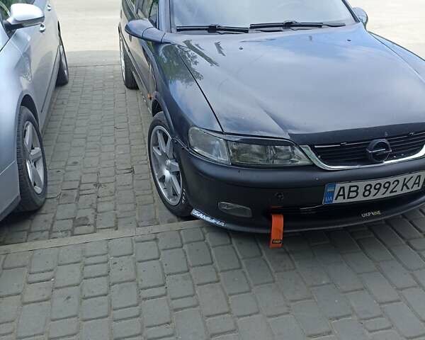 Черный Опель Вектра, объемом двигателя 1.6 л и пробегом 372 тыс. км за 3500 $, фото 1 на Automoto.ua