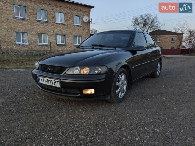 Черный Опель Вектра, объемом двигателя 1.6 л и пробегом 300 тыс. км за 2299 $, фото 1 на Automoto.ua