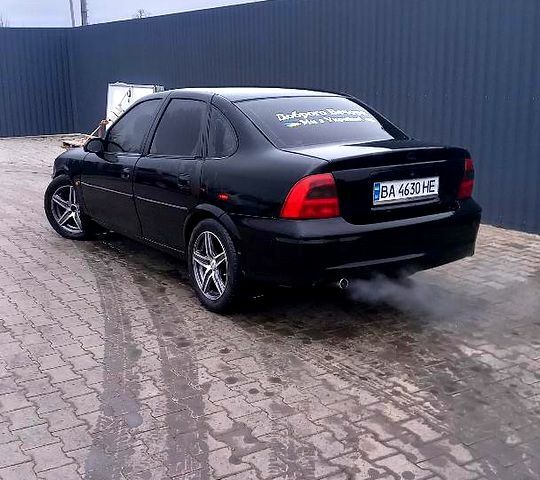 Черный Опель Вектра, объемом двигателя 2 л и пробегом 189 тыс. км за 2400 $, фото 1 на Automoto.ua