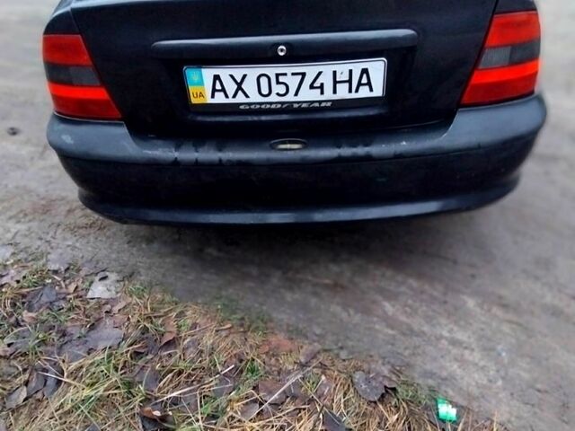 Чорний Опель Вектра, об'ємом двигуна 1.8 л та пробігом 200 тис. км за 1000 $, фото 1 на Automoto.ua