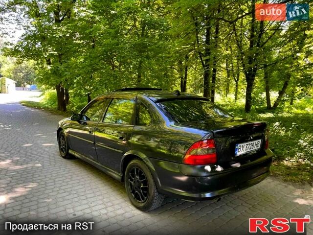 Черный Опель Вектра, объемом двигателя 1.6 л и пробегом 100 тыс. км за 2000 $, фото 1 на Automoto.ua