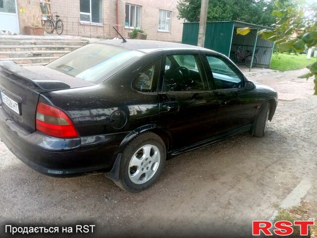 Черный Опель Вектра, объемом двигателя 2 л и пробегом 200 тыс. км за 2700 $, фото 1 на Automoto.ua