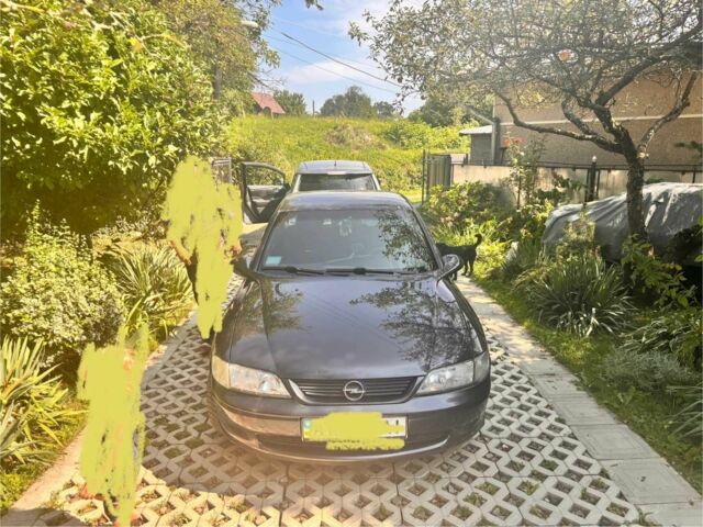 Чорний Опель Вектра, об'ємом двигуна 1.6 л та пробігом 235 тис. км за 2599 $, фото 1 на Automoto.ua