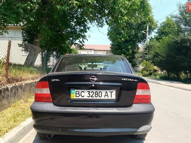 Черный Опель Вектра, объемом двигателя 1.6 л и пробегом 300 тыс. км за 2200 $, фото 1 на Automoto.ua