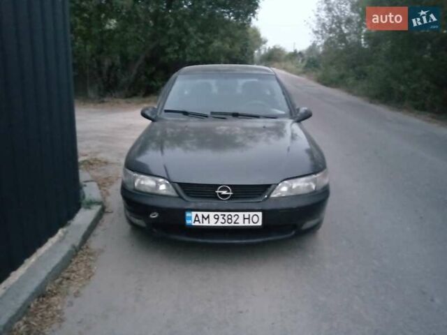 Черный Опель Вектра, объемом двигателя 2.5 л и пробегом 285 тыс. км за 1900 $, фото 1 на Automoto.ua