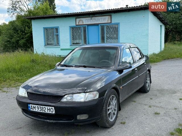 Черный Опель Вектра, объемом двигателя 2.5 л и пробегом 300 тыс. км за 1250 $, фото 1 на Automoto.ua