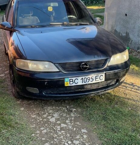 Черный Опель Вектра, объемом двигателя 2 л и пробегом 350 тыс. км за 1400 $, фото 1 на Automoto.ua