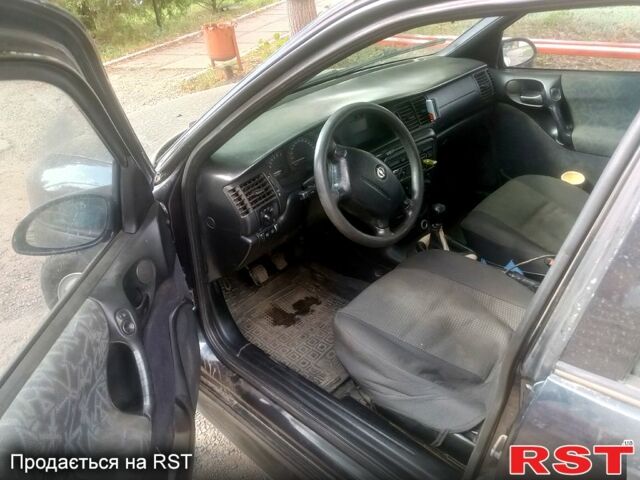 Чорний Опель Вектра, об'ємом двигуна 2 л та пробігом 320 тис. км за 3200 $, фото 1 на Automoto.ua