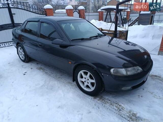 Черный Опель Вектра, объемом двигателя 1.8 л и пробегом 447 тыс. км за 1950 $, фото 1 на Automoto.ua