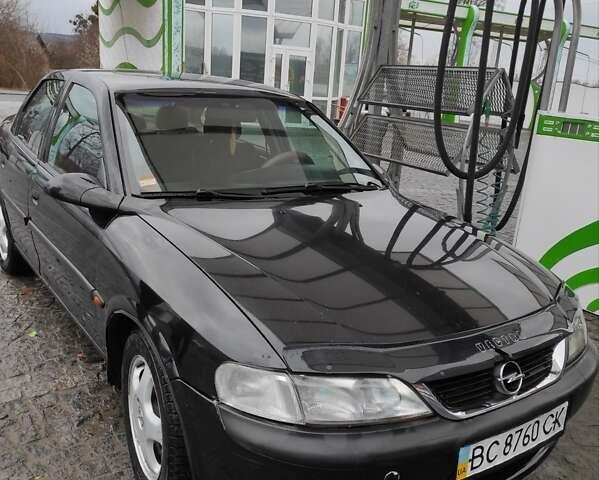 Черный Опель Вектра, объемом двигателя 1.8 л и пробегом 300 тыс. км за 1650 $, фото 1 на Automoto.ua
