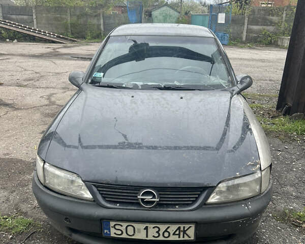 Черный Опель Вектра, объемом двигателя 1.6 л и пробегом 352 тыс. км за 1133 $, фото 1 на Automoto.ua