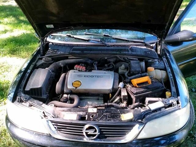 Чорний Опель Вектра, об'ємом двигуна 1.6 л та пробігом 300 тис. км за 1650 $, фото 1 на Automoto.ua